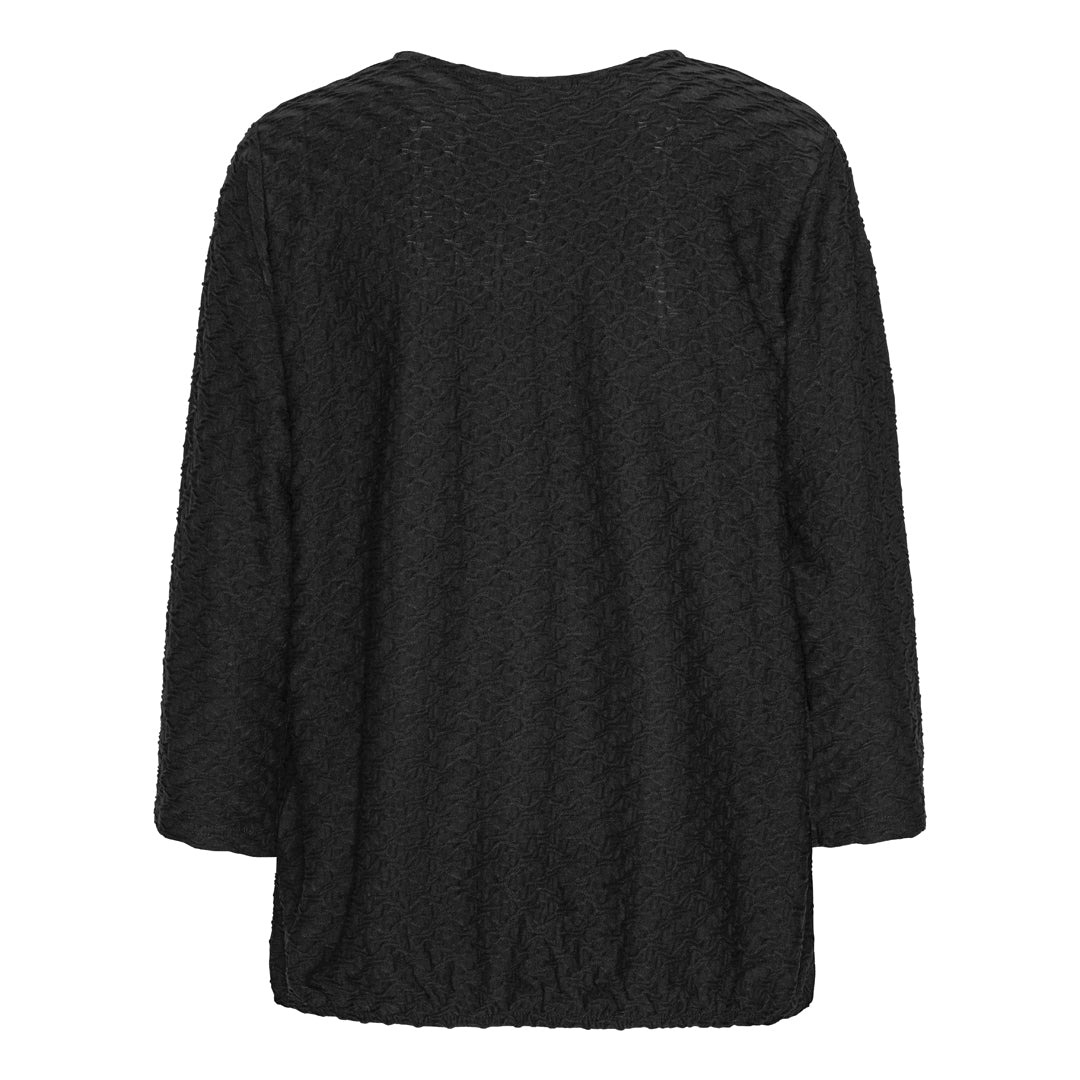 Mjuk blus med struktur och resårkant från Brandtex
