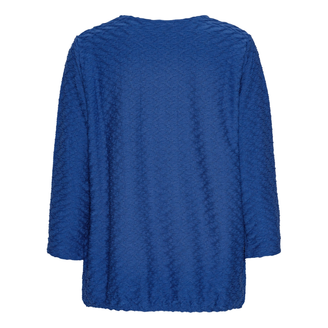 Mjuk blus med struktur och resårkant från Brandtex