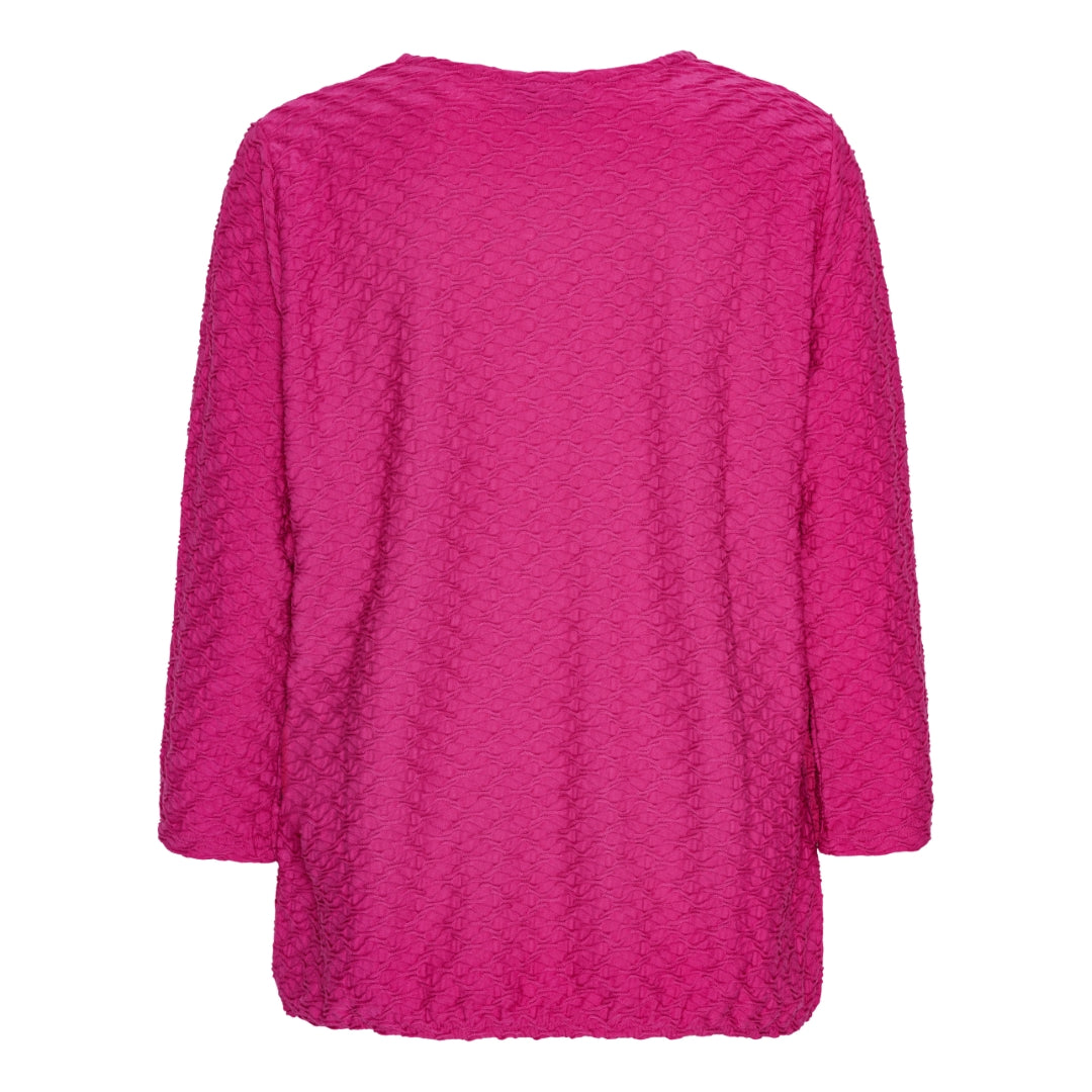 Mjuk blus med struktur och resårkant från Brandtex