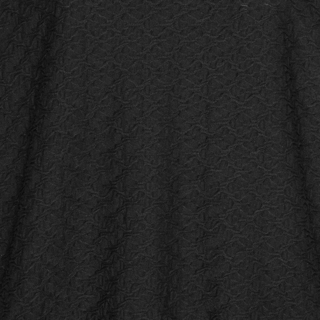 Mjuk blus med struktur och resårkant från Brandtex