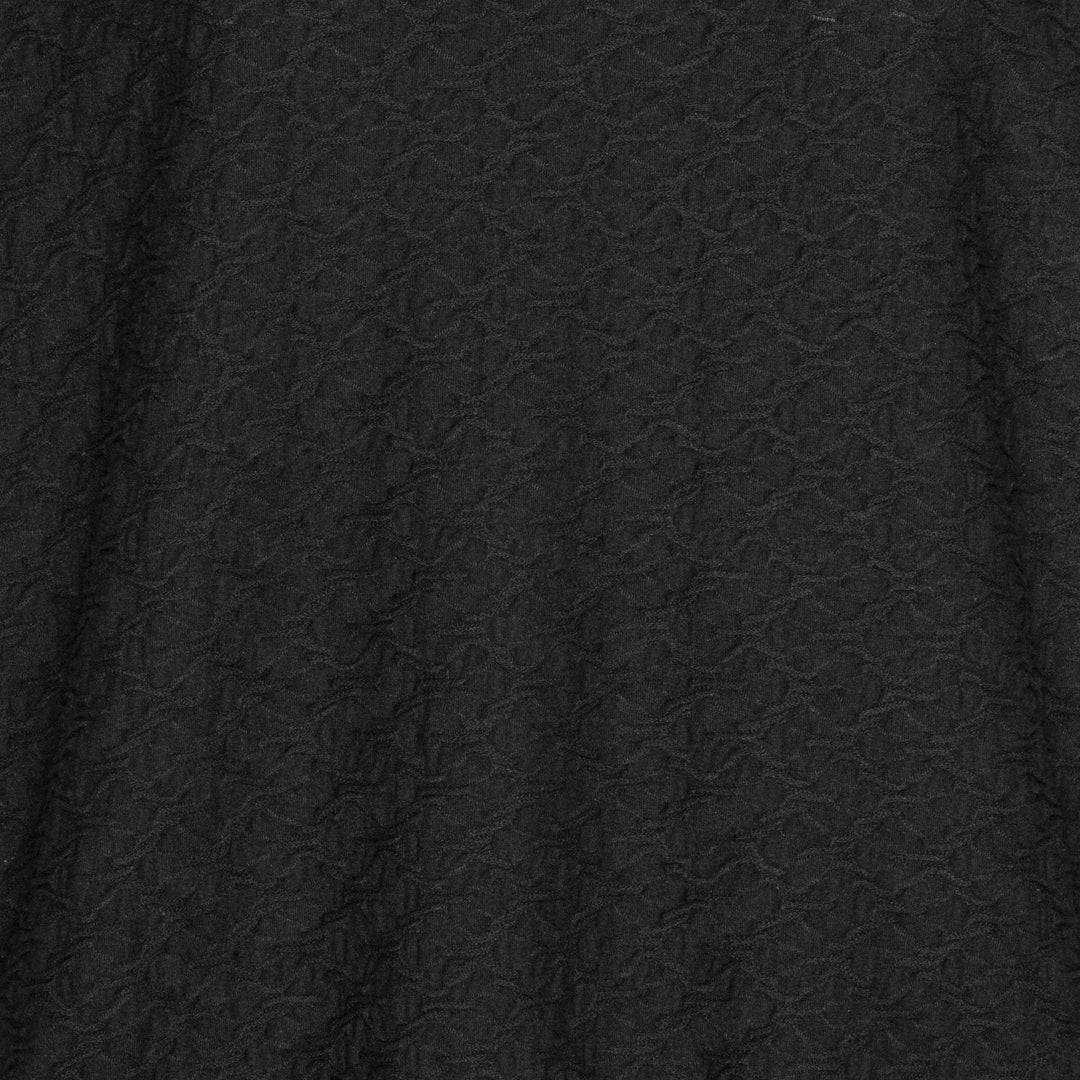 Mjuk blus med struktur och resårkant från Brandtex