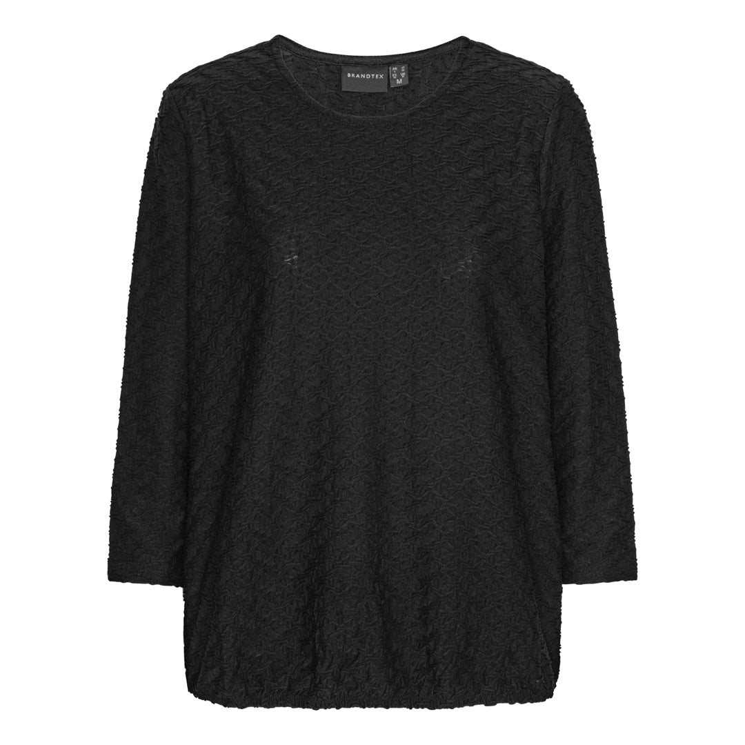 Mjuk blus med struktur och resårkant från Brandtex