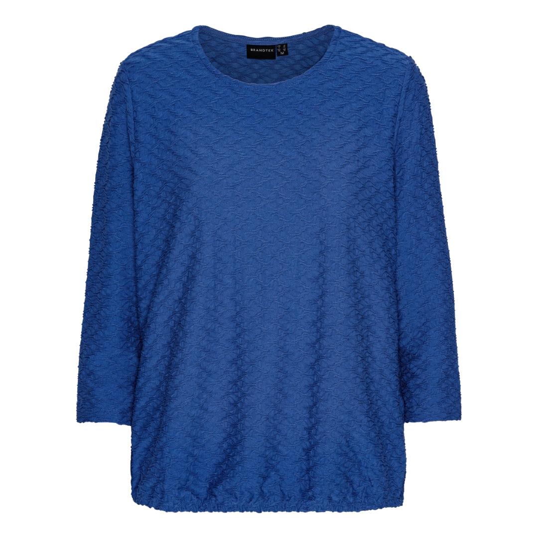 Mjuk blus med struktur och resårkant från Brandtex