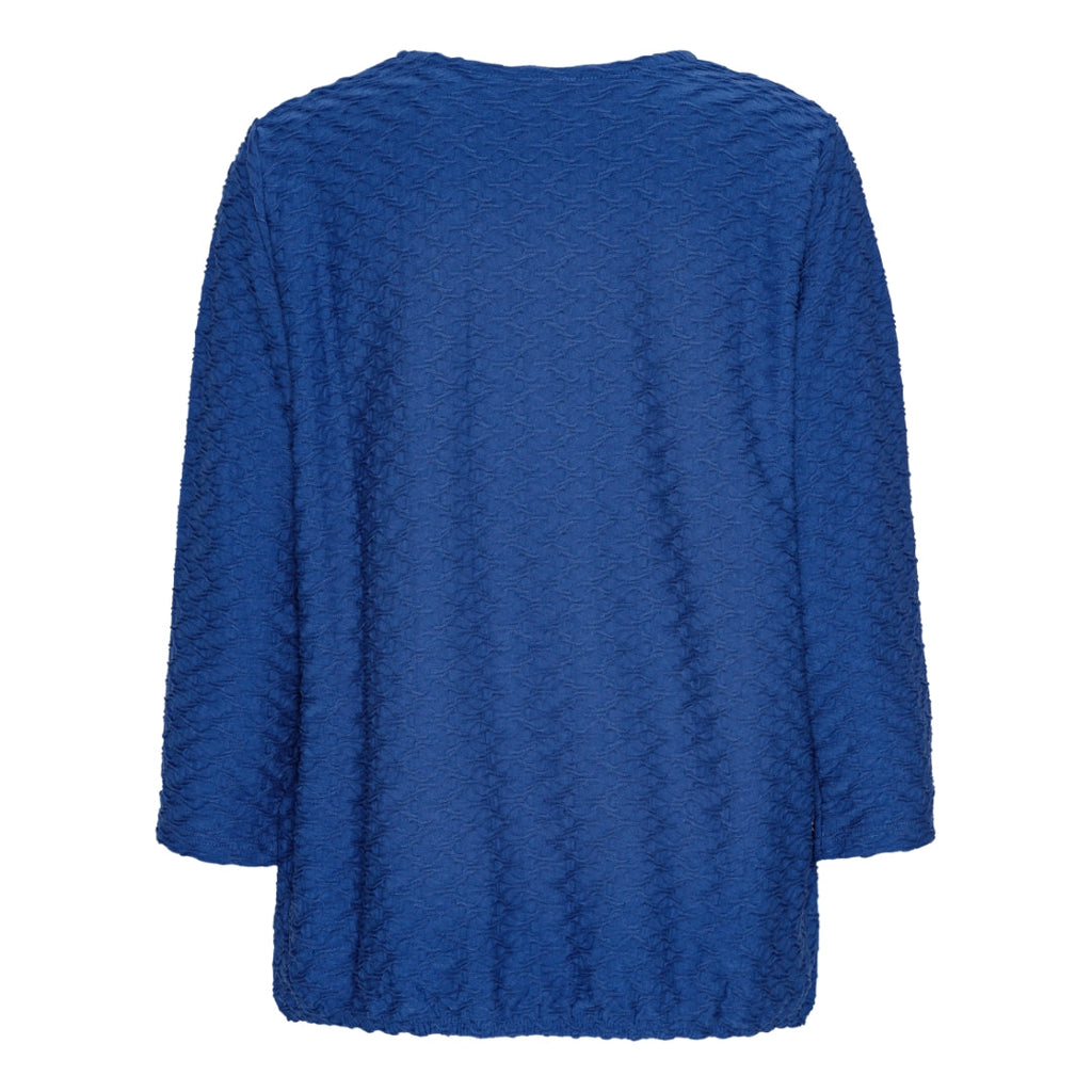 Mjuk blus med struktur och resårkant från Brandtex
