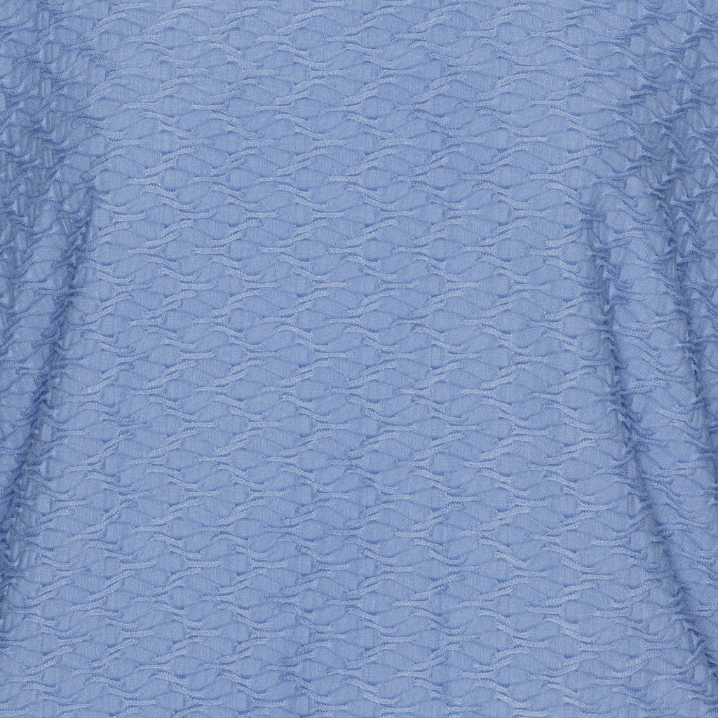 Mjuk blus med struktur och resårkant från Brandtex