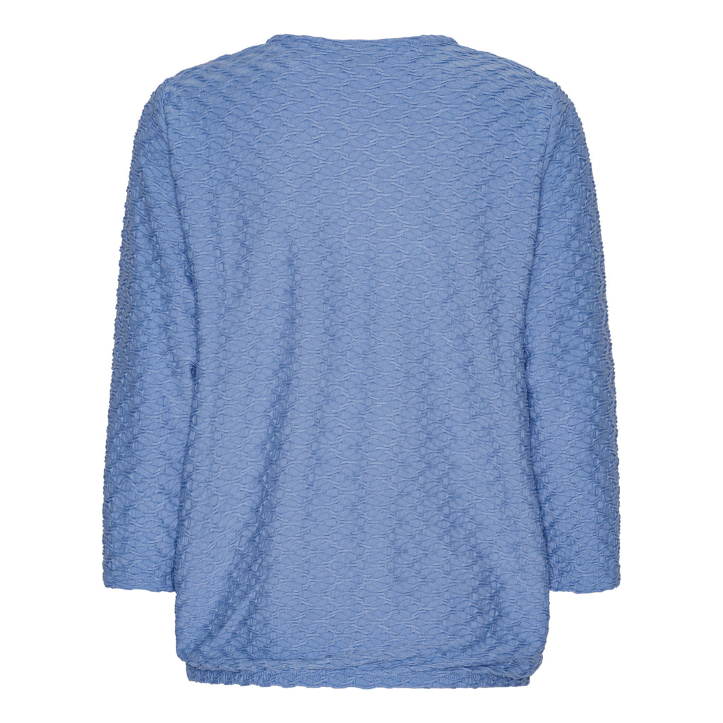 Mjuk blus med struktur och resårkant från Brandtex