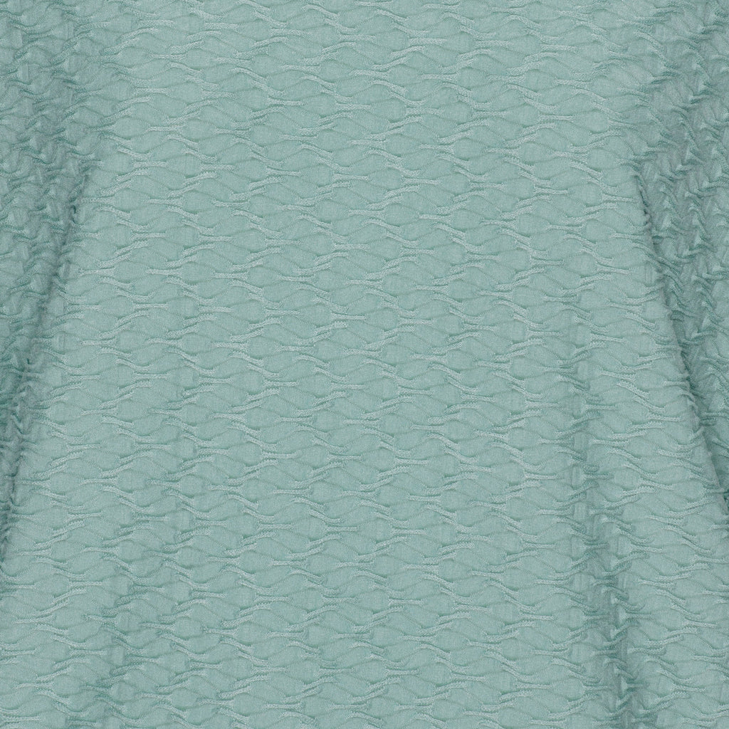 Mjuk blus med struktur och resårkant från Brandtex